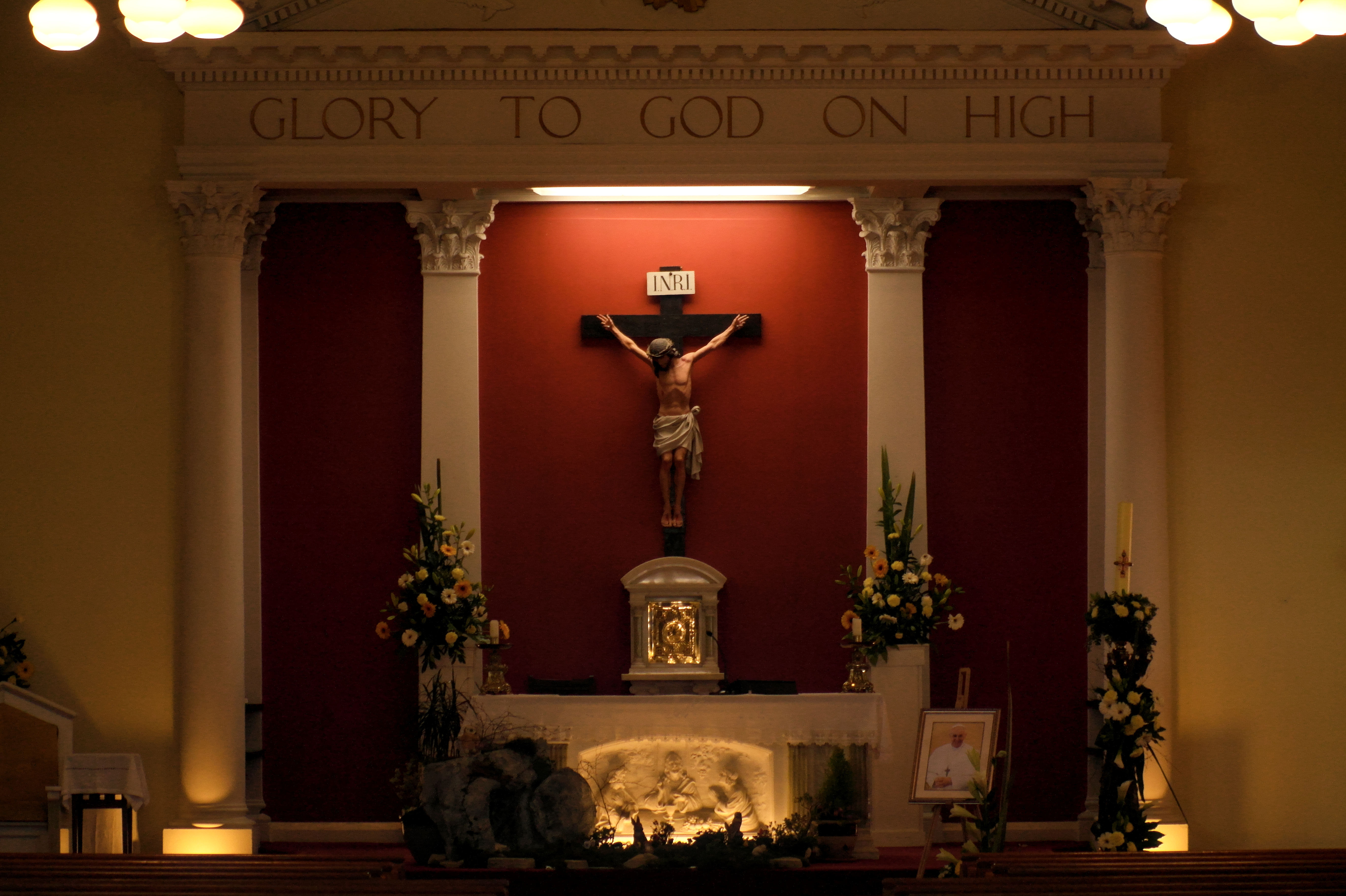 The altar at St. Mary's Oratory Catholic Church, Buncrana. Note the portrait of the late Pope Francis.