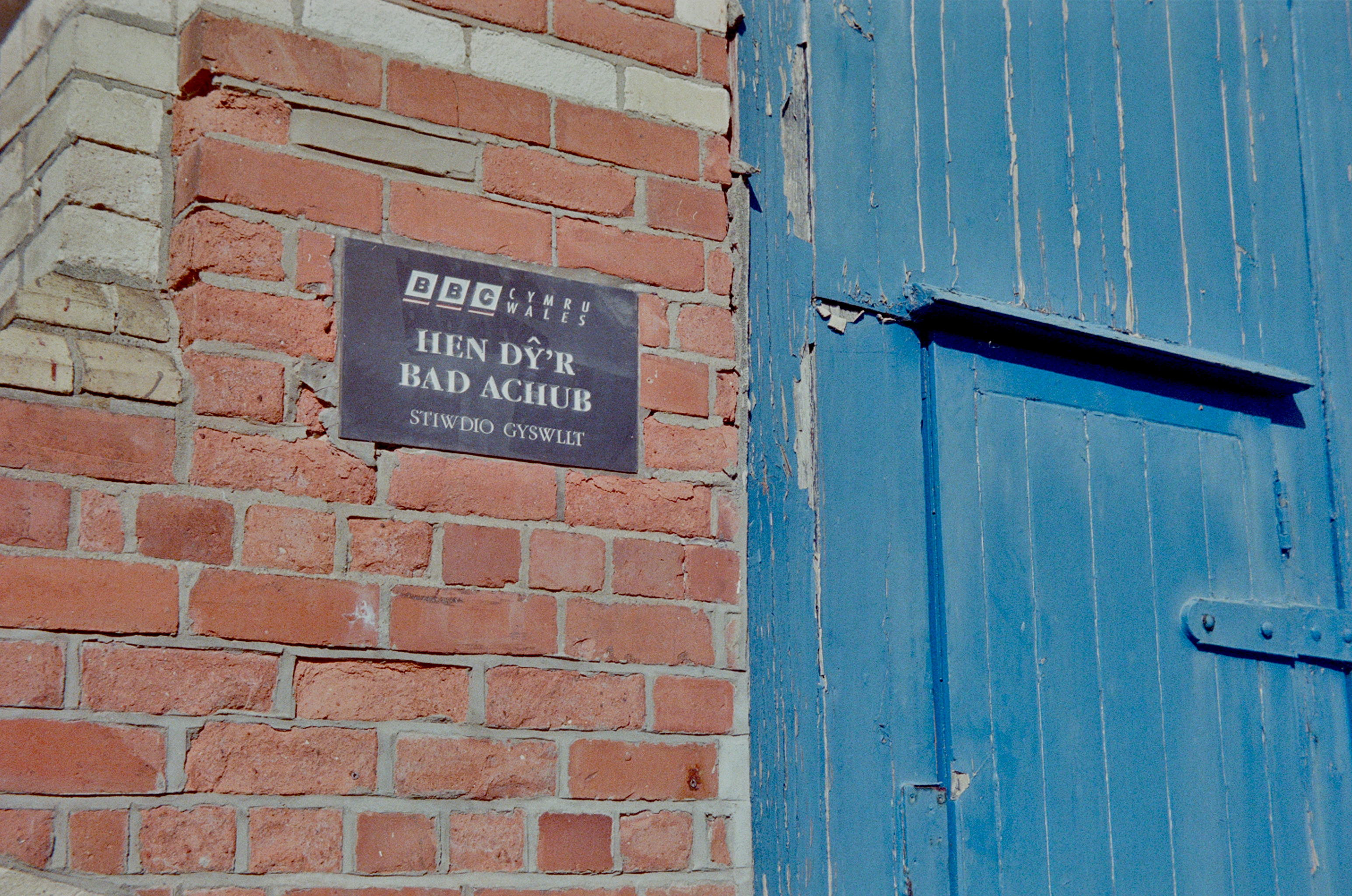 Former RNLI Lifeboat Station and later BBC contact studio on Morfa Mawr/Queen's Road, Aberystwyth. Taken on 35mm film with a Kodak Retinette 1A.
