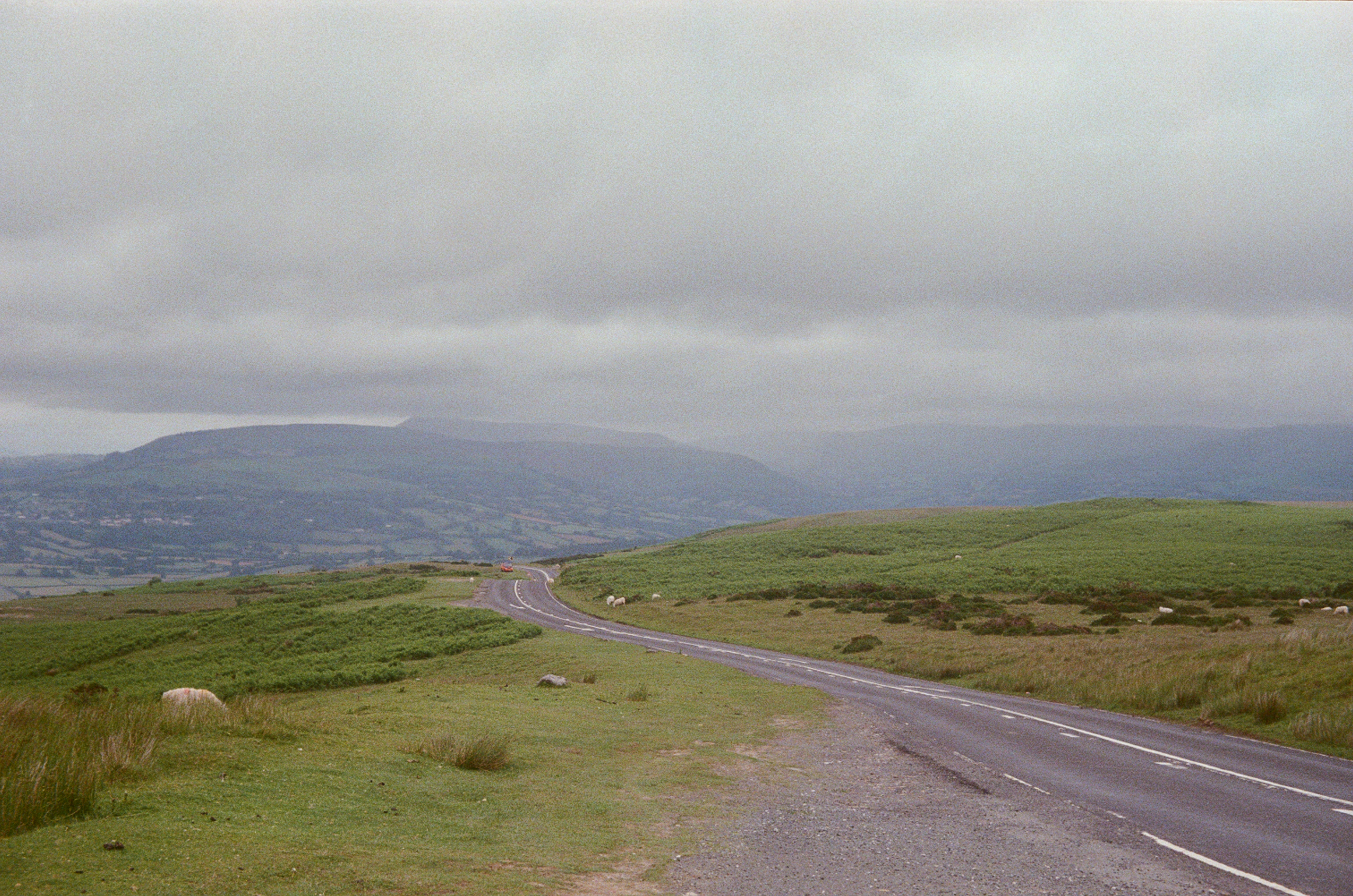View from the B4560 at the Llangynidr Limestone Quarry, facing north towards Llangynidr town and Tretower. Taken on 35mm film with a Kodak Retinette 1A.