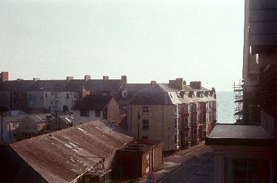 View of Cardigan Bay from a bedroom window in Aberystwyth. Taken on 35mm film with a Kodak Retinette 1A.
